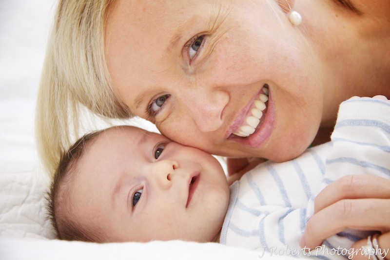 Mum and bub cheek to cheek- baby portrait photography sydney